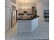 Kitchen features a large island and ample cabinetry at 1833 Queen Palm Dr, Apopka, FL 32712