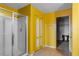 Bathroom featuring separate toilet, shower, and closet areas, along with a towel rack at 1911 Betsy Ross Ln, St Cloud, FL 34769