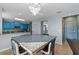 Kitchen includes a granite countertop island with pendant lighting and barstool seating, ideal for entertaining at 1911 Betsy Ross Ln, St Cloud, FL 34769