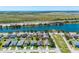 Street view of homes near a lake, with green space and a scenic view at 1911 Betsy Ross Ln, St Cloud, FL 34769