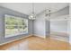 Bright dining room with hardwood floors and chandelier at 3440 Sandlor Dr, Deltona, FL 32738