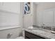Stylish bathroom featuring a granite countertop, modern fixtures, and bright natural light at 3955 Lana Ave, Davenport, FL 33897