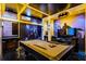 Themed game room with a pool table and custom Batman decor for entertainment at 3955 Lana Ave, Davenport, FL 33897