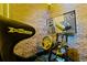 Game room with racing simulator setup, offering an immersive gaming experience at 3955 Lana Ave, Davenport, FL 33897