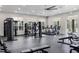 Bright gym with modern equipment including weights, treadmills, and weight training machines at 314 Rover Rd, Ormond Beach, FL 32174