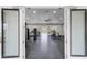 Full Gym view through double doors featuring an exit sign at 314 Rover Rd, Ormond Beach, FL 32174