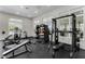 Well-equipped gym with treadmills, weights, and fitness machines for a full workout at 314 Rover Rd, Ormond Beach, FL 32174