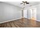 Spacious bedroom featuring wood-look floors and ceiling fan at 356 Nova Dr, Davenport, FL 33837