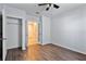 Bedroom with wood-look flooring and large closet at 356 Nova Dr, Davenport, FL 33837