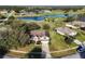 House with a golf course and lake view at 36711 Alaqua Ct, Eustis, FL 32736