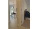 View from a bedroom doorway into a dining room at 36711 Alaqua Ct, Eustis, FL 32736