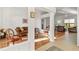 Bright living room with hardwood floors and a view into another room at 36711 Alaqua Ct, Eustis, FL 32736