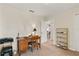 Office space with desk, shelving, and neutral carpet at 36711 Alaqua Ct, Eustis, FL 32736