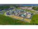 Aerial view of a new housing development, showing various stages of construction and completed homes at 438 Belmond Dr, Debary, FL 32713