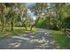 Peaceful bike path through lush trees at 438 Belmond Dr, Debary, FL 32713