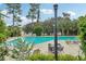 Refreshing community pool with lounge chairs at 438 Belmond Dr, Debary, FL 32713