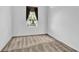 Cozy bedroom with neutral carpeting and a window with privacy blinds at 4538 Nottoway Dr, Leesburg, FL 34748