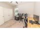 Bedroom features a dedicated desk and gaming area with dual monitors and a neutral color scheme at 1518 Alligator St, St Cloud, FL 34771