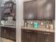 Gourmet kitchen features granite countertops, backsplash, and ample cabinet storage space at 1518 Alligator St, St Cloud, FL 34771