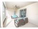 Comfortable lanai seating arrangement, ideal for casual conversation and entertaining guests at 1518 Alligator St, St Cloud, FL 34771