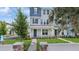 Charming, two-story townhome with a landscaped front yard and welcoming entryway at 2171 E South St # 5, Orlando, FL 32803