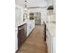 Kitchen featuring stainless steel appliances, subway tile backsplash, and hardwood floors at 2171 E South St # 5, Orlando, FL 32803