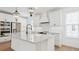 Spacious kitchen with a large island, stainless steel appliances, and recessed lighting at 2171 E South St # 5, Orlando, FL 32803