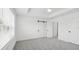 Bright main bedroom with neutral carpet, ceiling fan, and white trim at 2171 E South St # 5, Orlando, FL 32803