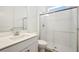 Bright bathroom featuring a glass-enclosed shower, modern vanity, and contemporary fixtures at 259 Severn Way # 38, Orlando, FL 32803