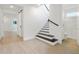 Hallway with a staircase and bathroom entrance at 259 Severn Way # 38, Orlando, FL 32803
