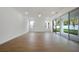 Bright living room featuring tile floors, recessed lighting, and sliding glass doors that open to the backyard at 259 Severn Way # 38, Orlando, FL 32803