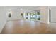 A spacious living room with tile floors and sliding glass doors leading to the backyard patio at 259 Severn Way # 38, Orlando, FL 32803