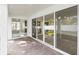 Brick-laid patio with sliding glass doors leading to the interior at 259 Severn Way # 38, Orlando, FL 32803