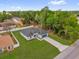Beautiful home with lush landscaping, a long driveway, and mature trees in a quiet neighborhood at 494 Marion Oaks Trl, Ocala, FL 34473
