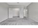 Neutral bedroom with carpet and a large closet with double doors at 11357 Satire St, Orlando, FL 32832