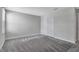 Comfortable bedroom offers a neutral color palette and a closet for storage at 11357 Satire St, Orlando, FL 32832