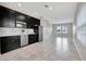 Spacious kitchen featuring modern cabinetry, stainless steel appliances, and an open layout at 11357 Satire St, Orlando, FL 32832