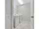 Convenient laundry room with tile flooring and appliances at 11357 Satire St, Orlando, FL 32832