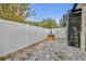 Private backyard with a well-maintained fence and screened-in outdoor area at 3136 Heartleaf Pl, Winter Park, FL 32792