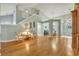 Living room with hardwood floors, high ceilings, and elegant decor at 3136 Heartleaf Pl, Winter Park, FL 32792