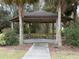 Gazebo in a lush, green common area, perfect for relaxing and enjoying the outdoors at 3612 Julius Estates Blvd, Winter Haven, FL 33881