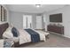 Main bedroom with a plush bed and dark brown dresser at 3612 Julius Estates Blvd, Winter Haven, FL 33881