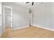 Spacious bedroom with closet, hardwood flooring, and ample natural light at 1904 Illinois St, Orlando, FL 32803