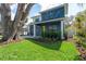 Beautiful two-story home with a large tree in the front yard and well-maintained landscaping at 1904 Illinois St, Orlando, FL 32803