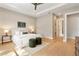 Neutral bedroom offers comfort and style with its tray ceiling, and plush accents at 1904 Illinois St, Orlando, FL 32803