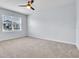 Bright bedroom with neutral walls and carpet flooring at 5166 Tana Ter, Saint Cloud, FL 34772