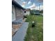 Charming single-story home with a cozy front porch, landscaping, and a well-maintained lawn at 16 N Lancelot Ave, Orlando, FL 32835