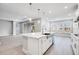Modern kitchen with white cabinets and island at 2944 Arranmore Dr, Ormond Beach, FL 32174