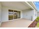Covered patio with sliding glass doors at 2944 Arranmore Dr, Ormond Beach, FL 32174