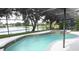 Beautiful screened pool and spa with lake view at 1513 Blue Sky Way, Clermont, FL 34714